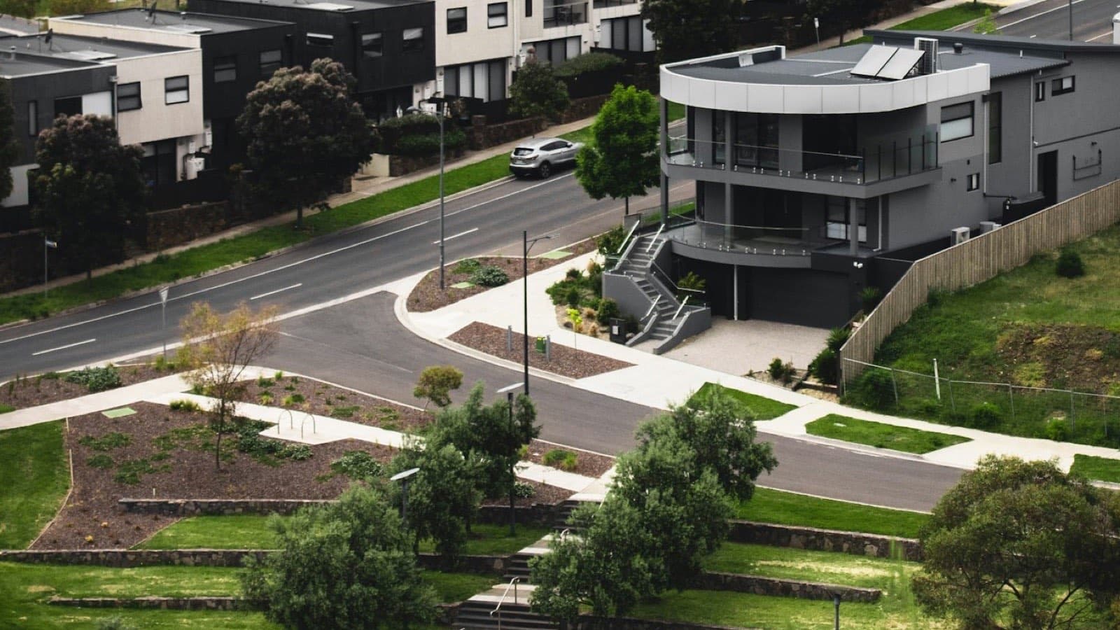 Modern houses stepping down a sloping street