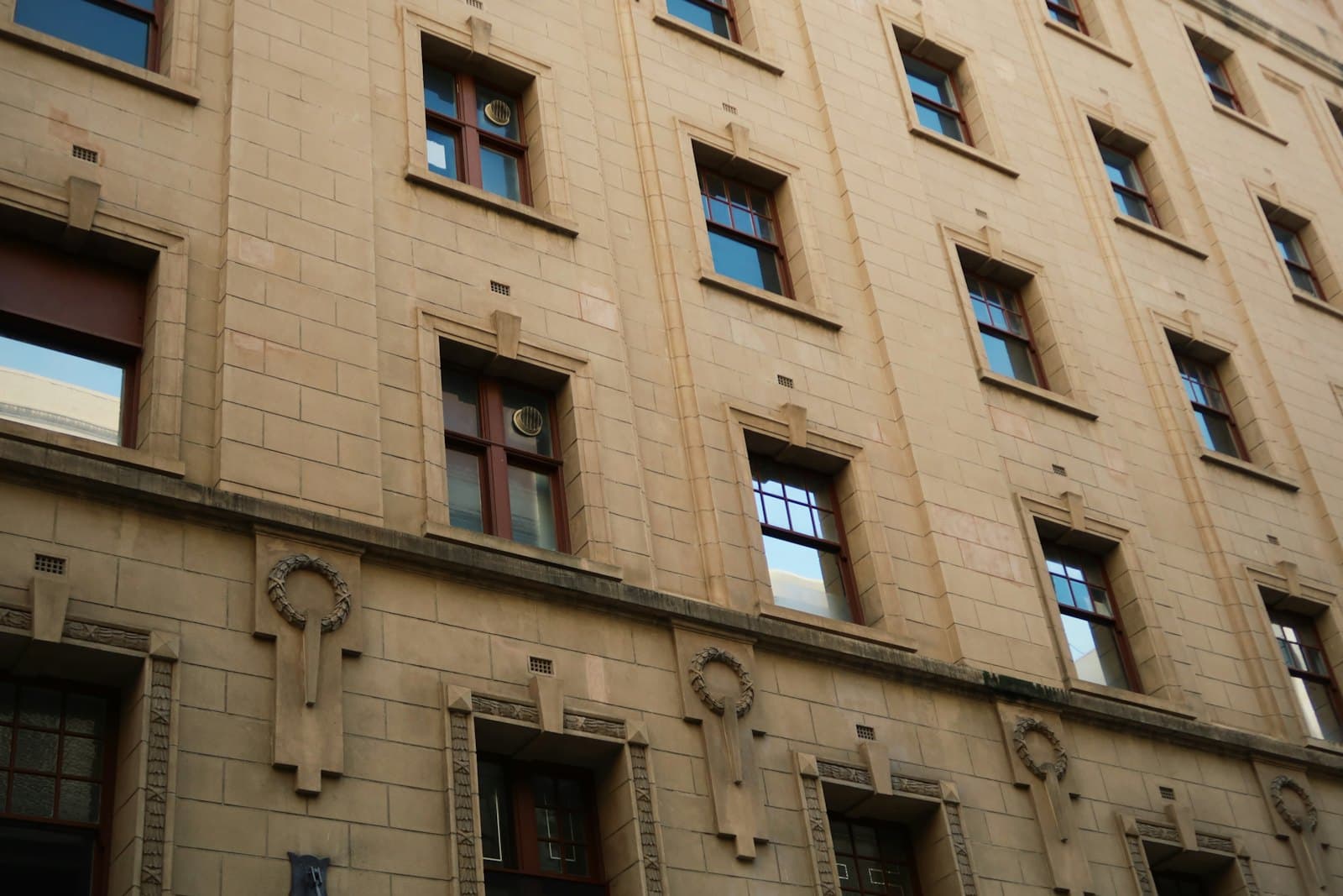 Placeholder photograph of a sandstone commercial office facade