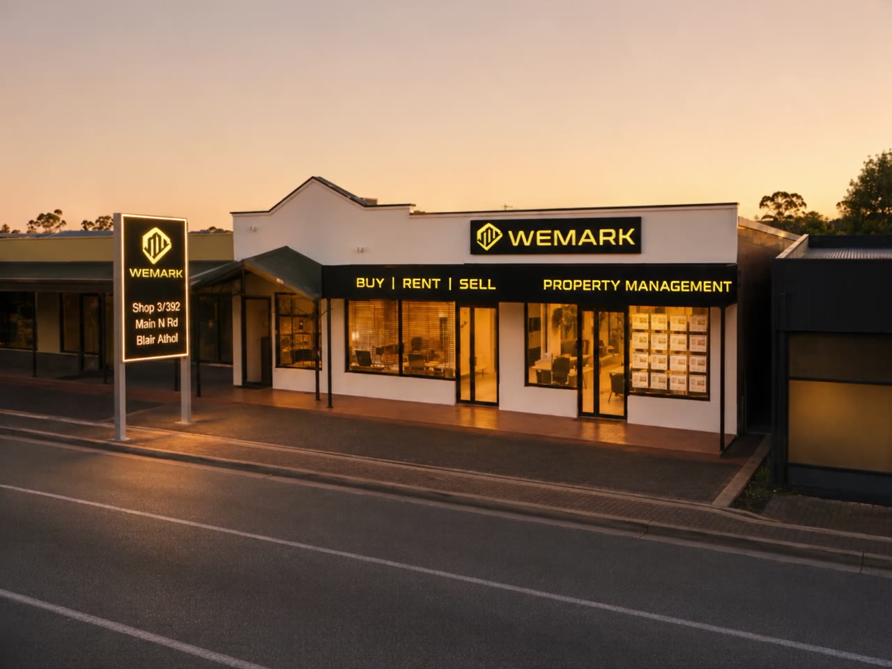 Wemark Real Estate office on Main North Road, Blair Athol, at dusk